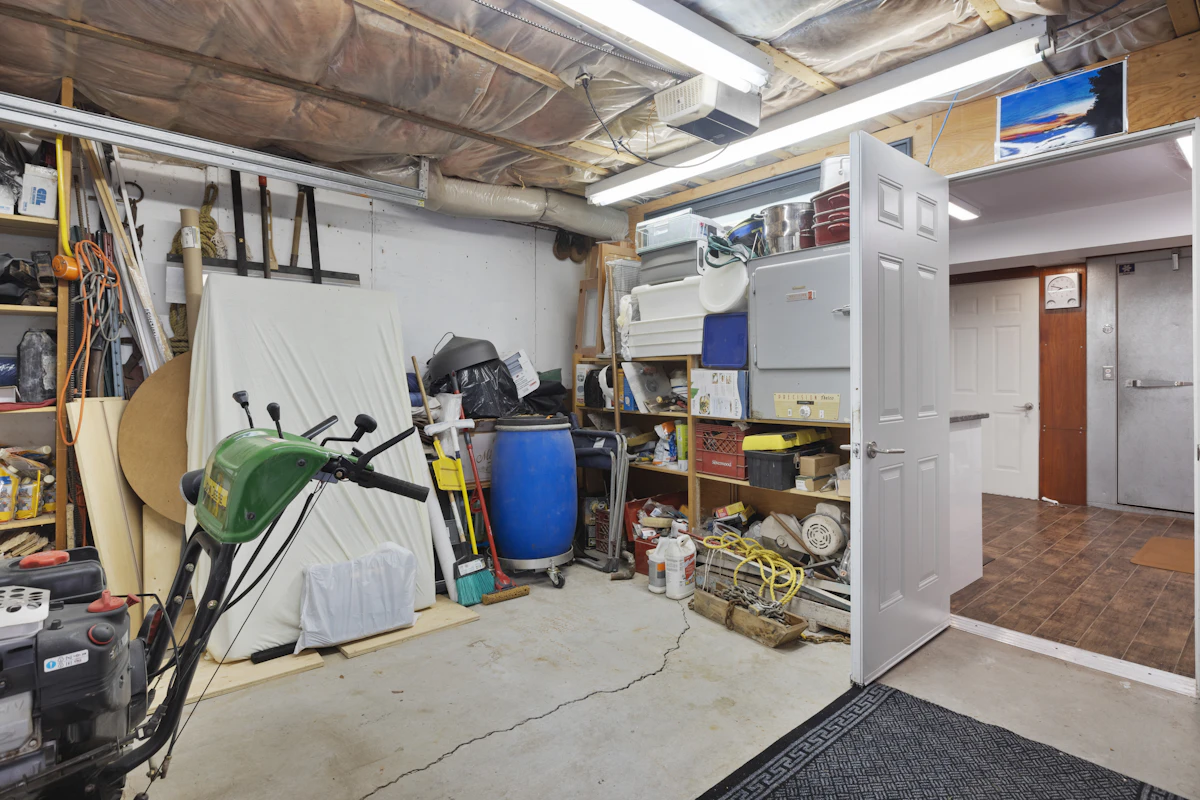 A cluttered garage full of items ready for a cleanout