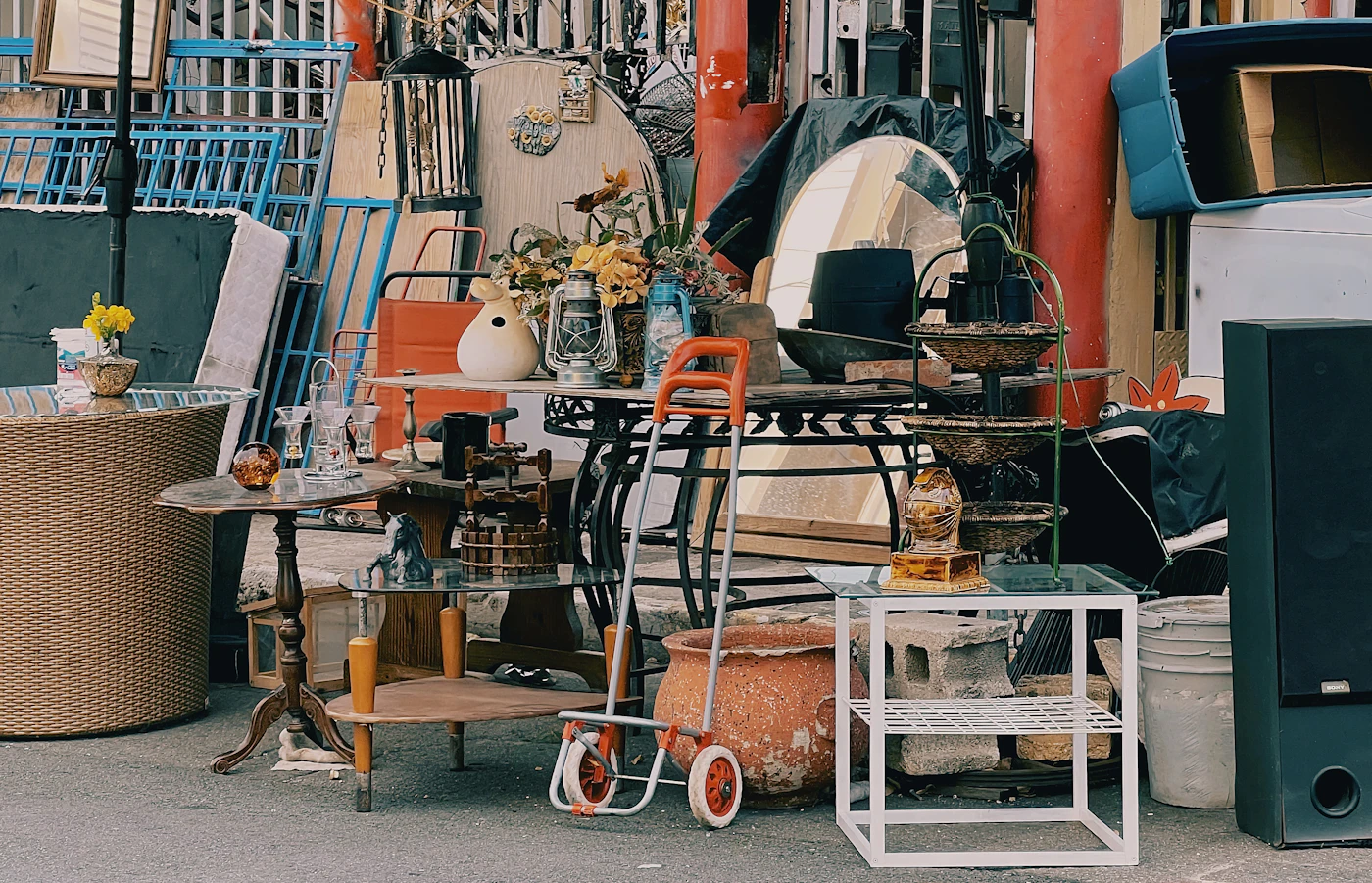 Furniture and household items gathered curbside for junk removal